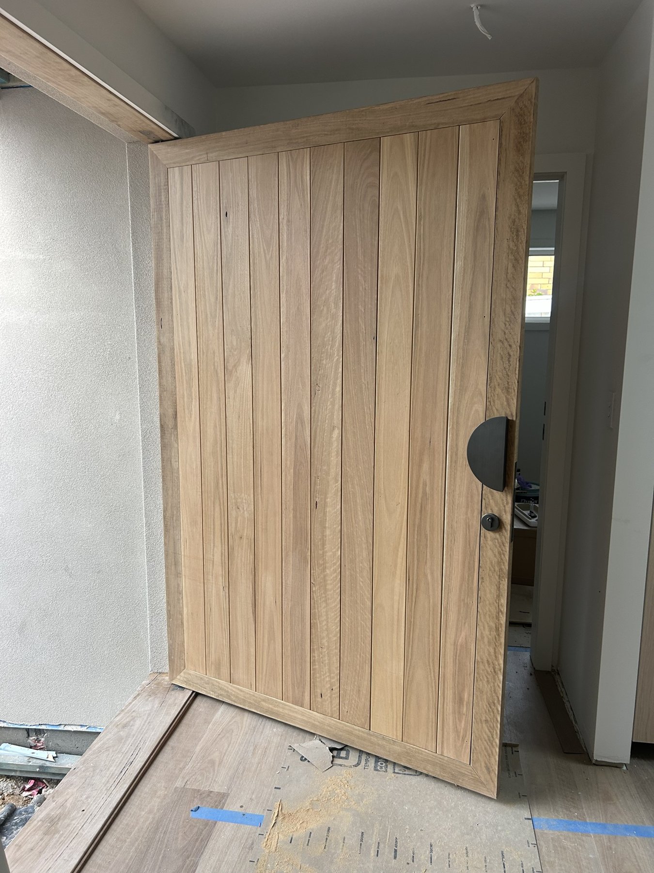 Feature hardwood pivot door