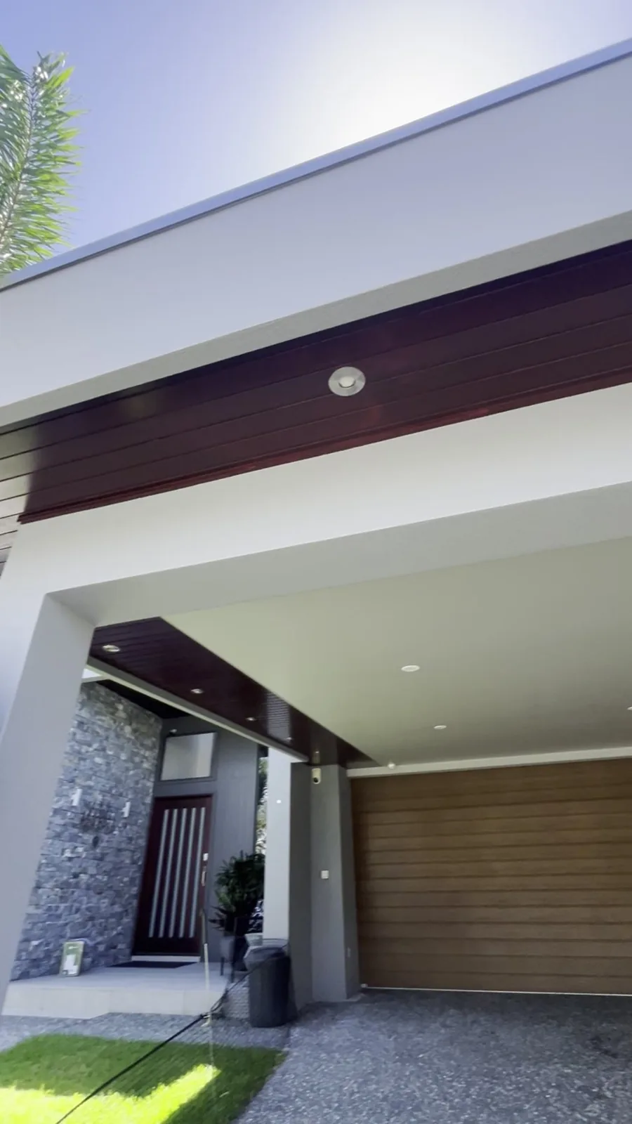 Custom carport with timber-lined ceiling and integrated lighting, Gold Coast